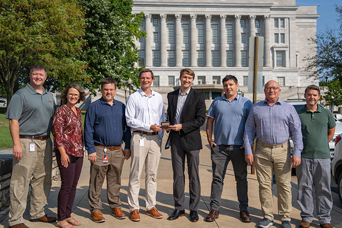 BNSF representatives present the Tracking to Zero award to Missouri officials.