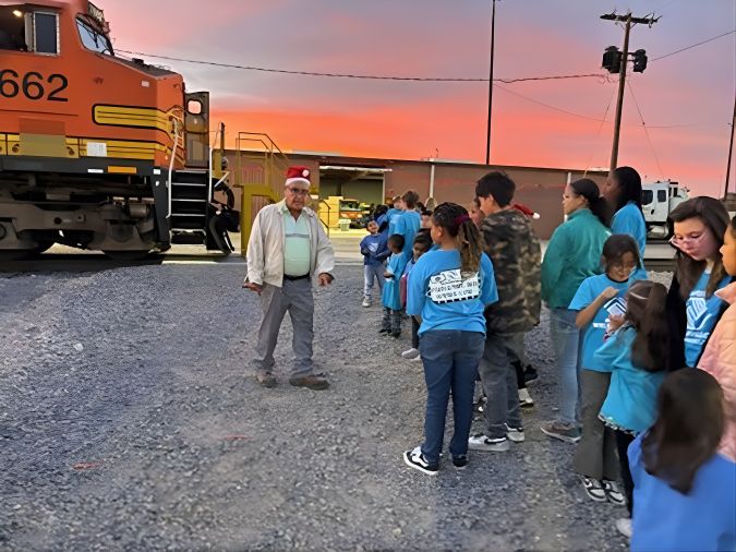 Maverick Club members arrive at Amarillo. 