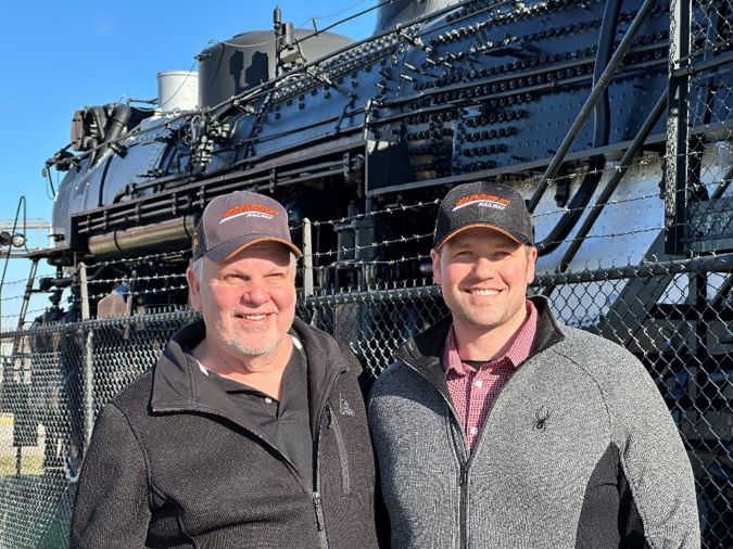Tim Worrell, right, with his father, Ken Worrell, locomotive engineer 